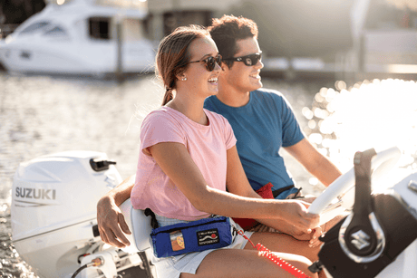 Suzuki 20 HP White Remote in use on Dinghy