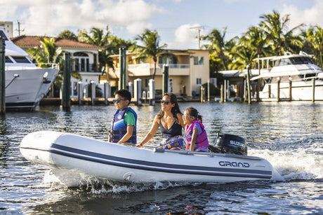 Suzuki 20 HP Black Tiller in Use on Dinghy