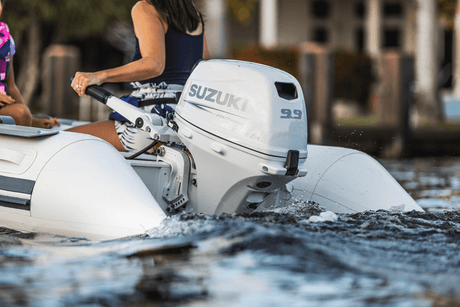 Suzuki 9.9 HP White Tiller in Use on Dinghy